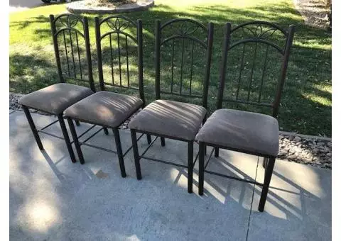 4 metal chairs with padded seats